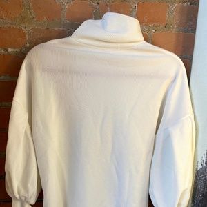 White turtleneck shirt
